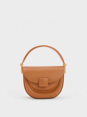 Charles & Keith Koa Half-Moon Saddle Bag Chocolate | 0218759-BV