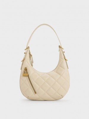 Charles & Keith Swing Padlock Acolchado Crescent Bag Beige | 0368157-GJ